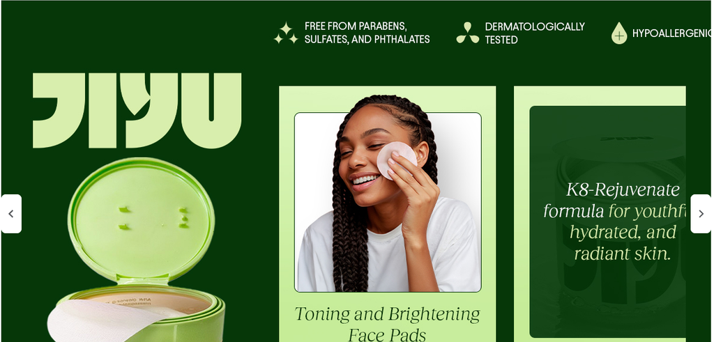 A skincare product image featuring JIYU Toner Pads in a container with a green-and-white design, presented as a 100-count Korean-inspired facial toner pad product. The pads are marketed with snail mucin, niacinamide, peptides, and Centella Asiatica for hydration and a brighter-looking complexion.
